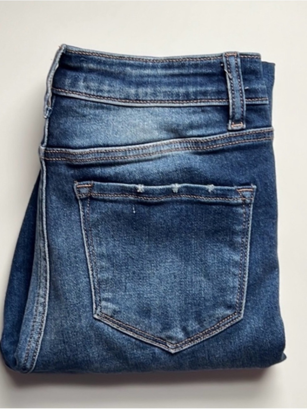 NWOT women's dark blue distressed jeans